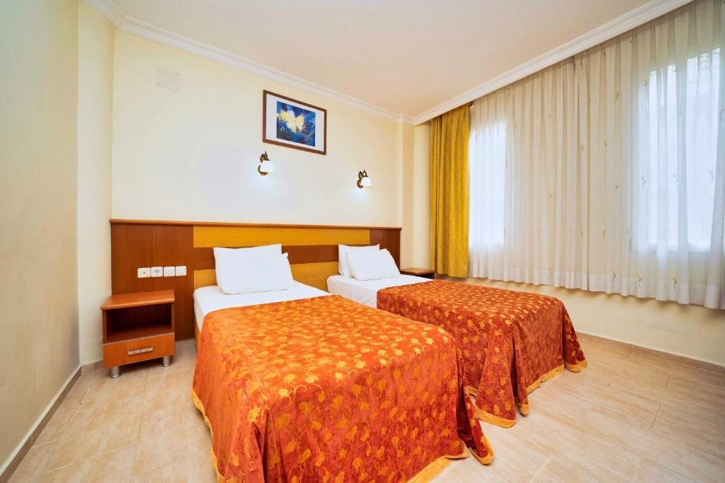 Двухместный (Стандартный двухместный номер с 1 кроватью или 2 отдельными кроватями) отеля Mavruka Hotel, Олюдениз