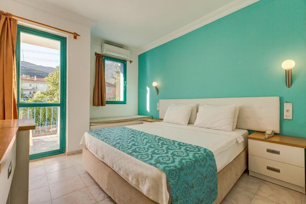 Семейный (Семейный номер с 2 спальнями) отеля Monta Verde Hotel & Villas, Олюдениз