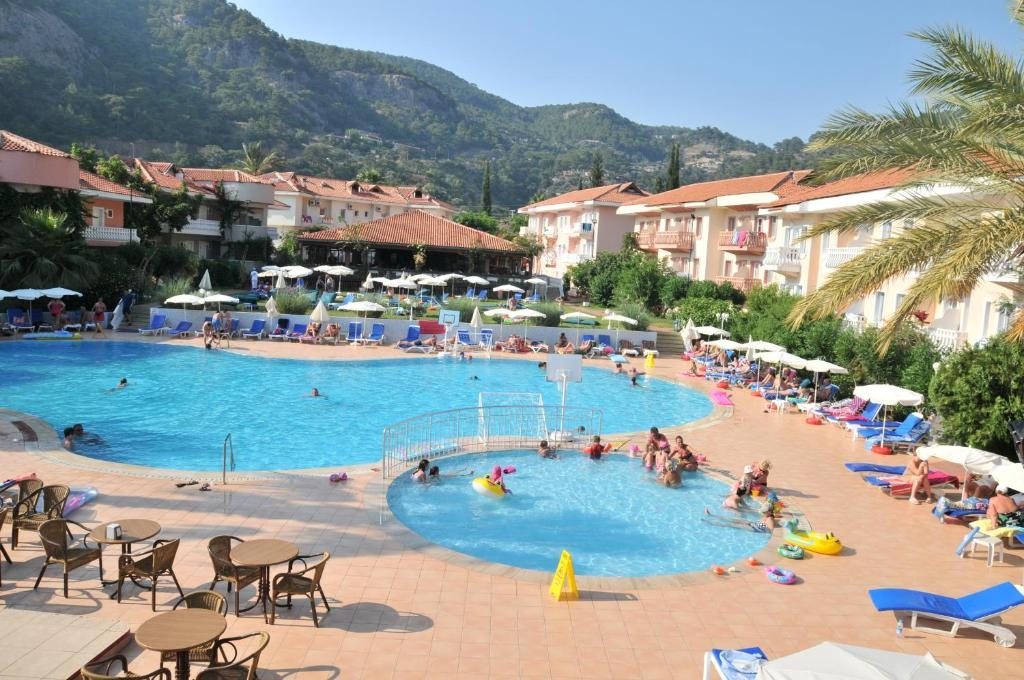 Club олюдениз. Туркуаз отель Фетхие. Олюдениз Туркуаз отель. Oludeniz Turquoise Hotel 4 Турция Олюдениз. Отель Ликия ботаника Бич Фетхие.