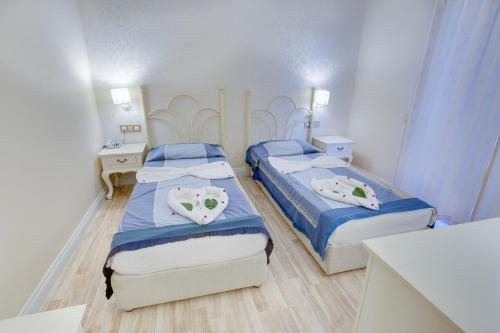 Двухместный (Двухместный номер с 2 отдельными кроватями и балконом) отеля Pinehill, Олюдениз