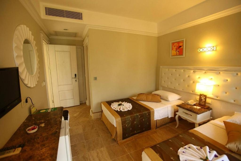 Двухместный (Стандартный двухместный номер с 1 кроватью или 2 отдельными кроватями) отеля Telmessos Select Hotel - Adult Only (+16) - All Inclusive, Олюдениз