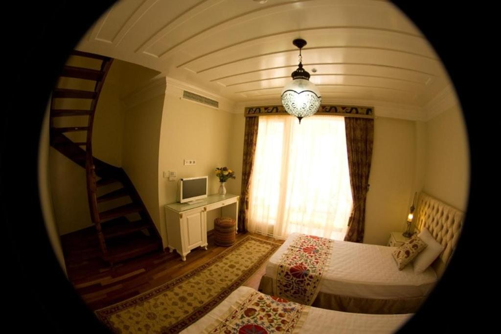 Трехместный (Двухуровневые апартаменты (для 4 взрослых)), Ersari Hotel