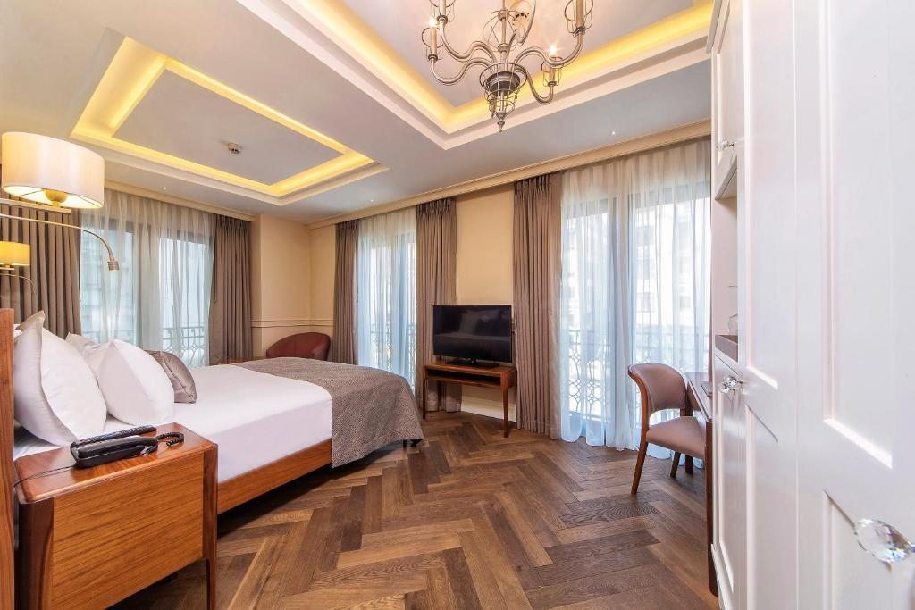Двухместный (Улучшенный двухместный номер с 1 кроватью и дополнительной кроватью) отеля Hotel Morione & Spa Center, Стамбул