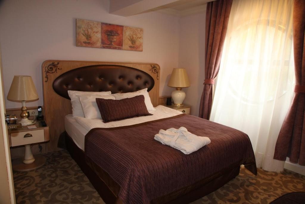 Двухместный (Стандартный двухместный номер с 1 кроватью или 2 отдельными кроватями) отеля Sonno Boutique Rooms & Suites, Анкара