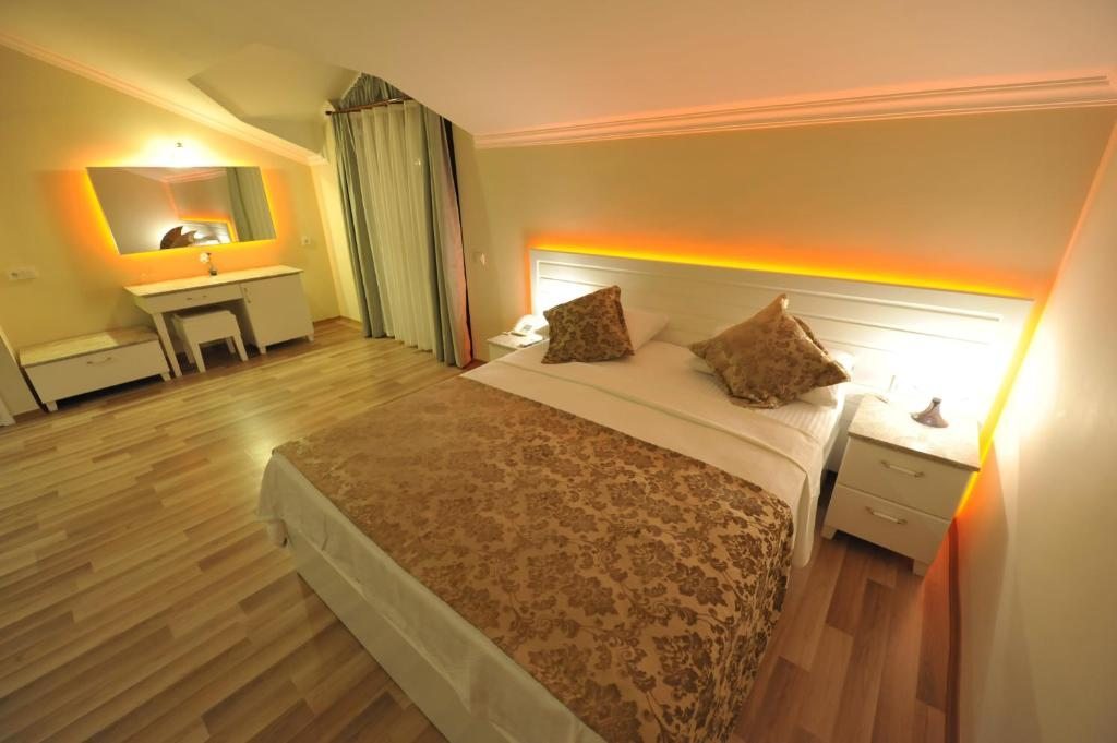 Двухместный (Роскошный двухместный номер с 1 кроватью) отеля Unsal Hotel, Олюдениз