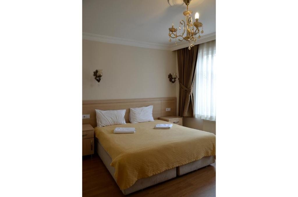 Двухместный (Улучшенный двухместный номер с 1 кроватью или 2 отдельными кроватями) хостела Piya Hostel, Стамбул