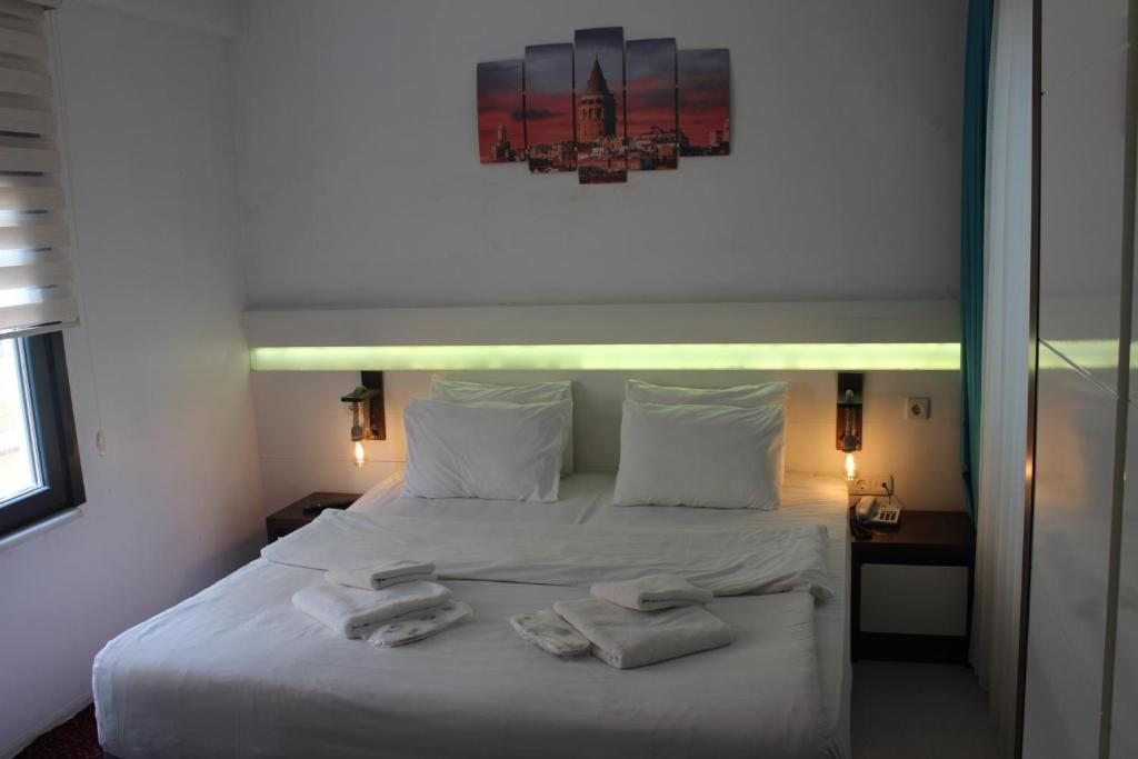 Двухместный (Двухместный номер с 1 кроватью или 2 отдельными кроватями) хостела Stanpoli Hostel, Стамбул