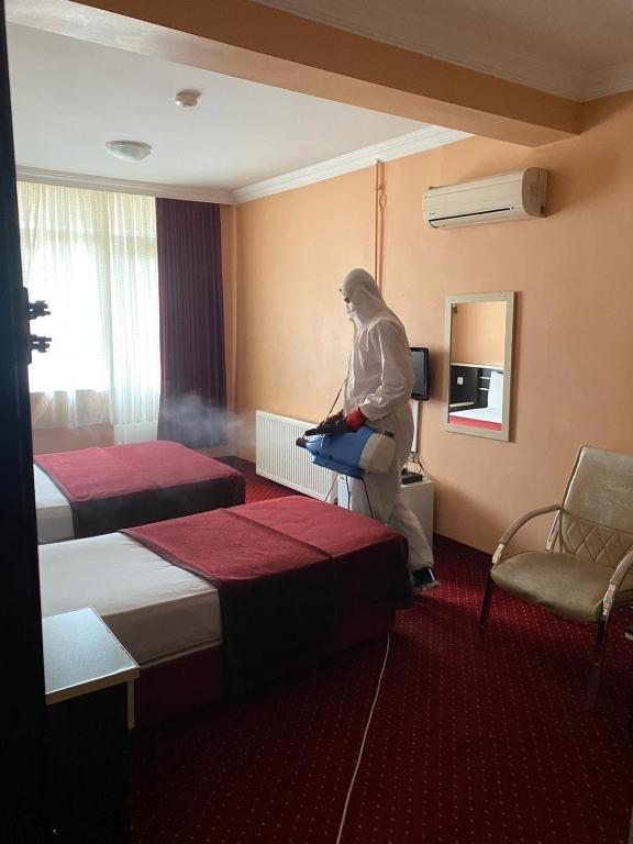 Трехместный (Трехместный номер) отеля Mina 1 Hotel, Анкара