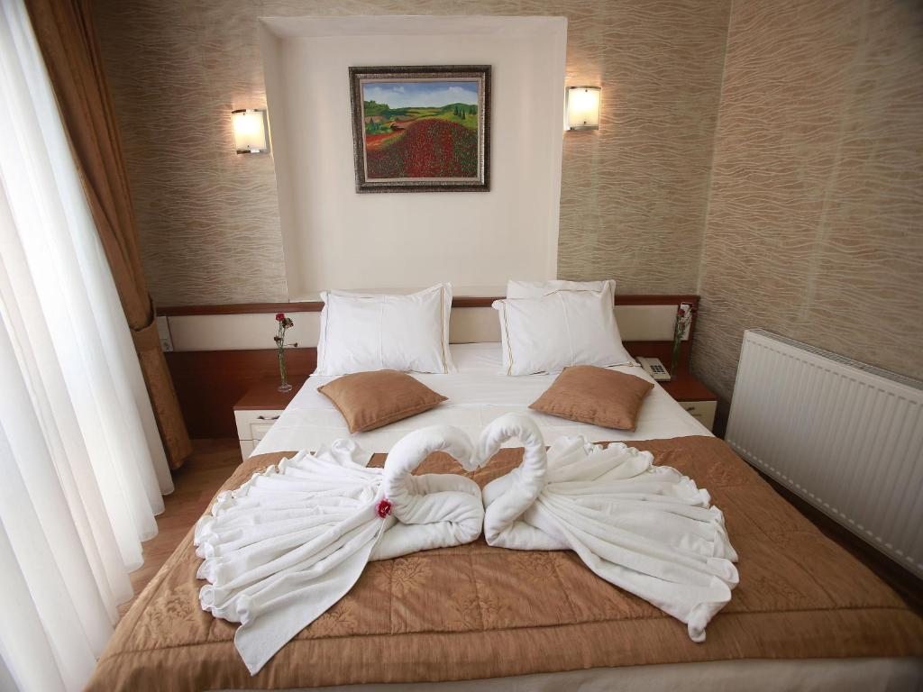 Двухместный (Двухместный номер с 1 кроватью или 2 отдельными кроватями) отеля Arife Sultan Hotel, Стамбул