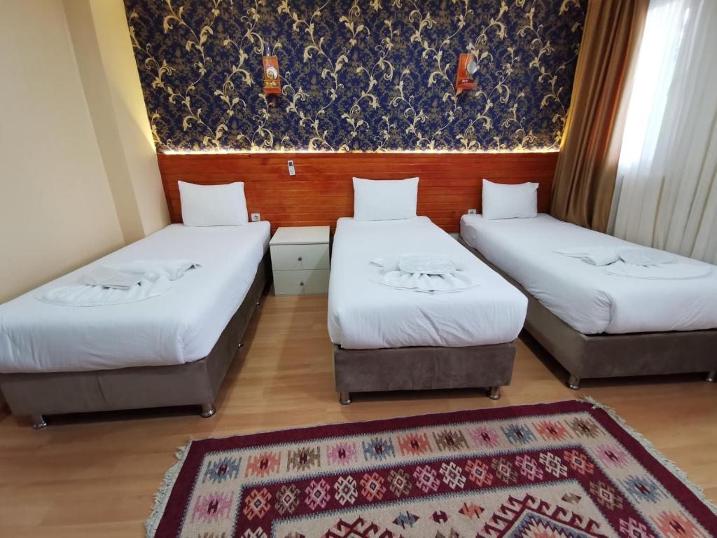 Трехместный (Трехместный номер) отеля Otantik Guesthouse, Стамбул