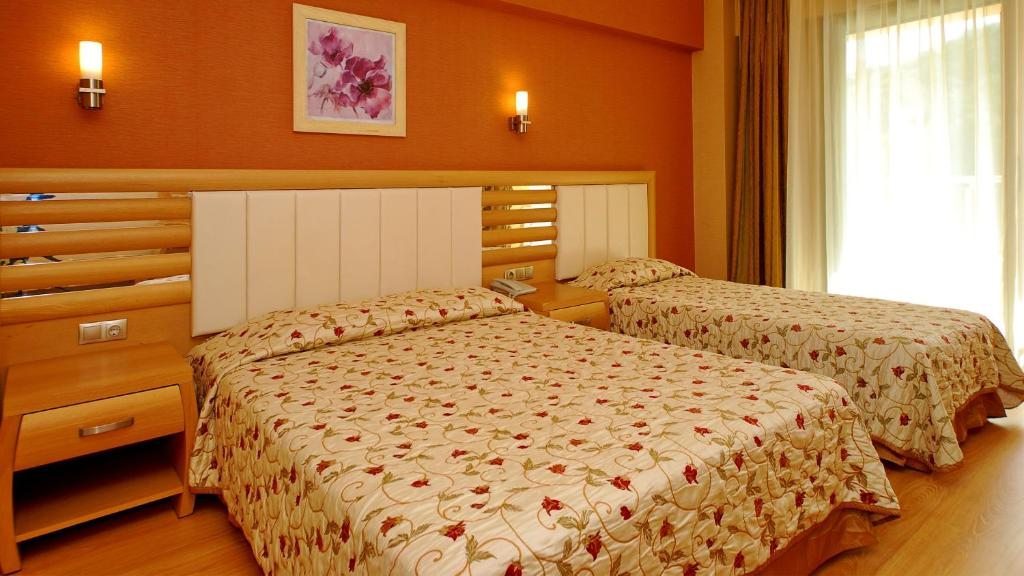 Двухместный (Стандартный двухместный номер с 1 кроватью или 2 отдельными кроватями) отеля Grand Pasa, Мармарис