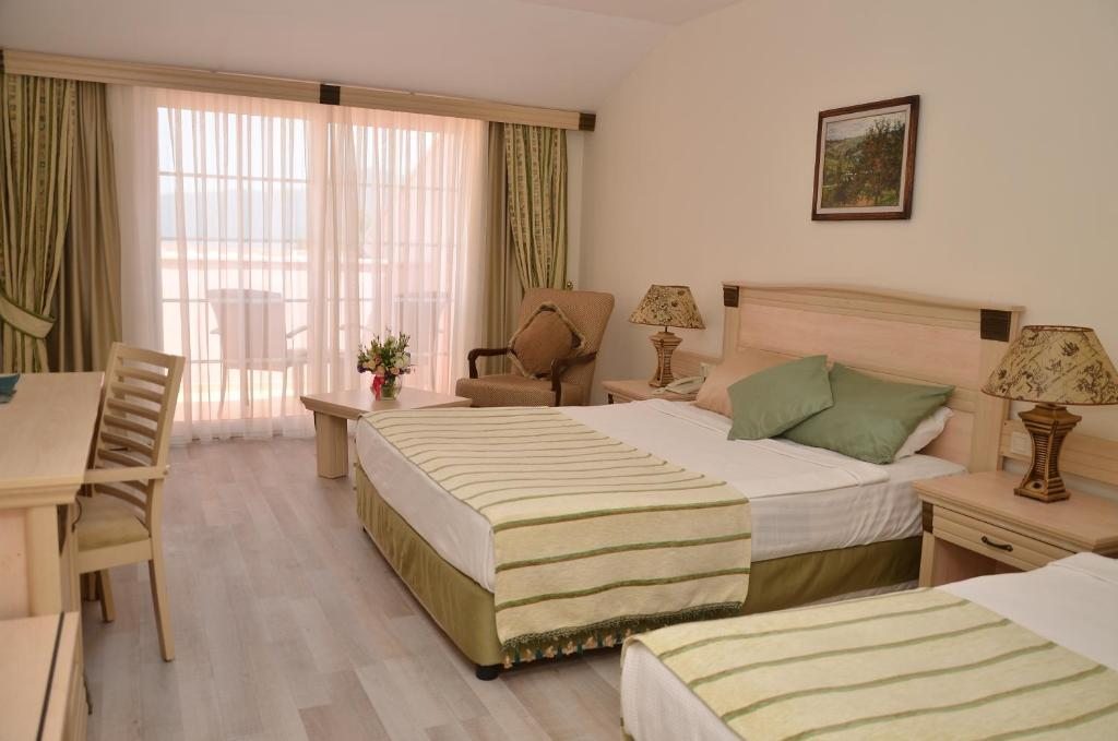 Двухместный (Стандартный двухместный номер с 1 кроватью или 2 отдельными кроватями) отеля Grand Yazici Club Turban, Мармарис