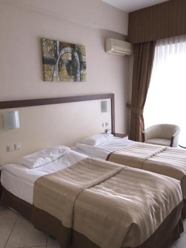 Двухместный (Двухместный номер эконом-класса с 1 кроватью или 2 отдельными кроватями) курортного отеля Batihan Beach Resort & Spa, Кушадасы