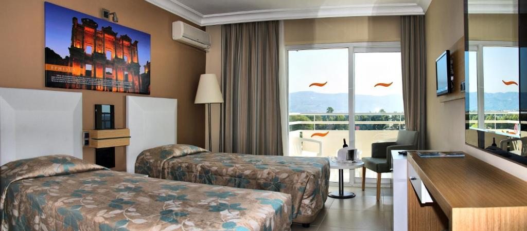 Двухместный (Стандартный двухместный номер с 1 кроватью или 2 отдельными кроватями и видом на море) курортного отеля Ephesia, Кушадасы