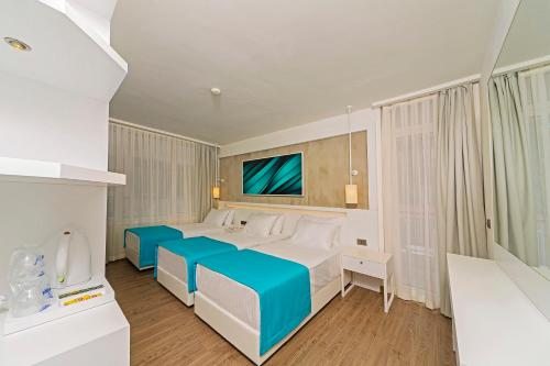 Двухместный (Двухместный номер с 1 кроватью или 2 отдельными кроватями, вид на сад (2+1)) отеля Poseidon Hotel - Scene concept, Мармарис