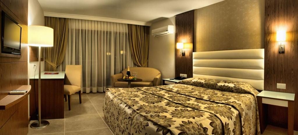 Двухместный (Улучшенный двухместный номер с 1 кроватью﻿ (+1 ребенок)) курортного отеля Omer Holiday Resort - All Inclusive, Кушадасы