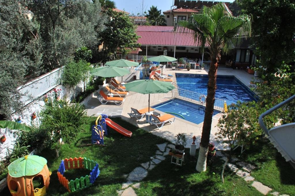 Двухместный (Двухместный номер с 1 кроватью и видом на бассейн) апарт-отеля Tokgoz Butik Hotel&Apartment, Олюдениз
