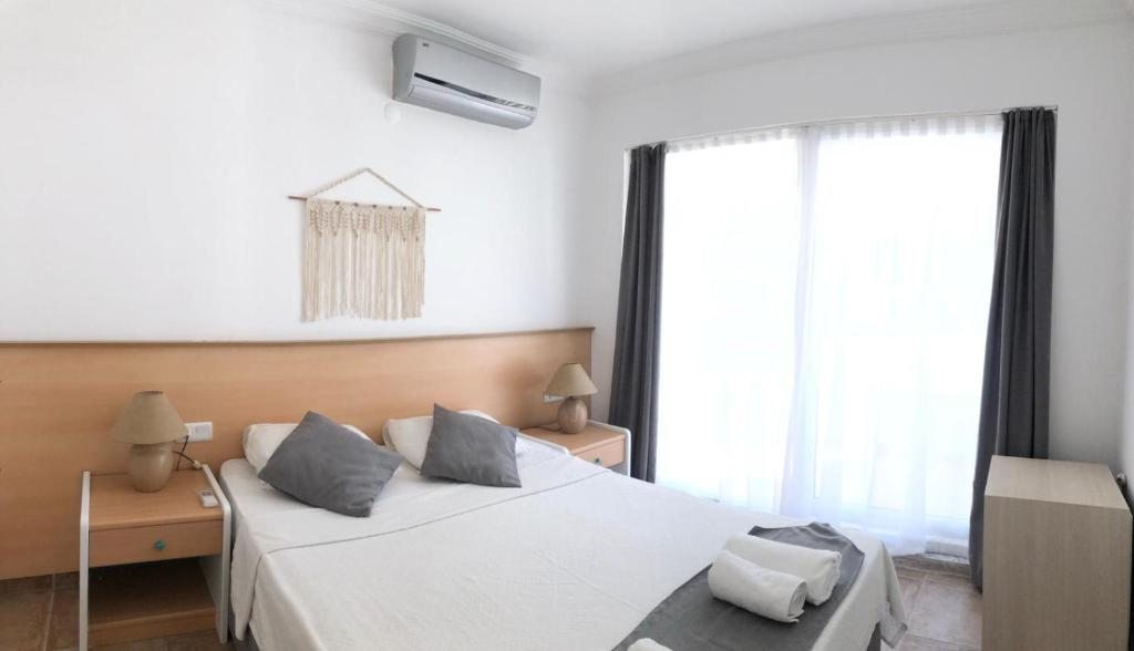 Двухместный (Стандартный двухместный номер с 1 кроватью) семейного отеля Mimosa Pension, Каш