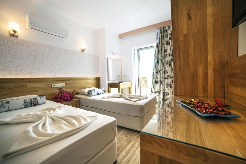 Двухместный (Стандартный двухместный номер с 1 кроватью или 2 отдельными кроватями и видом на море) отеля Nur Hotel, Каш