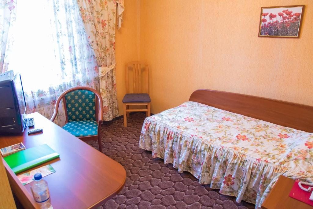 Двухместный (Двухместный номер с 2 отдельными кроватями и дополнительной кроватью) отеля Лотус, Астрахань