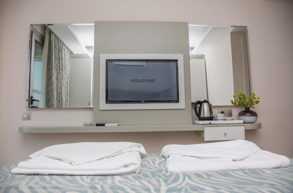Двухместный (Двухместный номер с 1 кроватью или 2 отдельными кроватями, частичный вид на море) отеля Asli, Мармарис