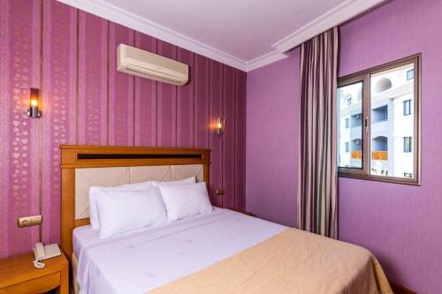 Семейный (Стандартный люкс с 2 спальнями (для 2 взрослых и 2 детей)) курортного отеля Cosmopolitan Resort, Мармарис