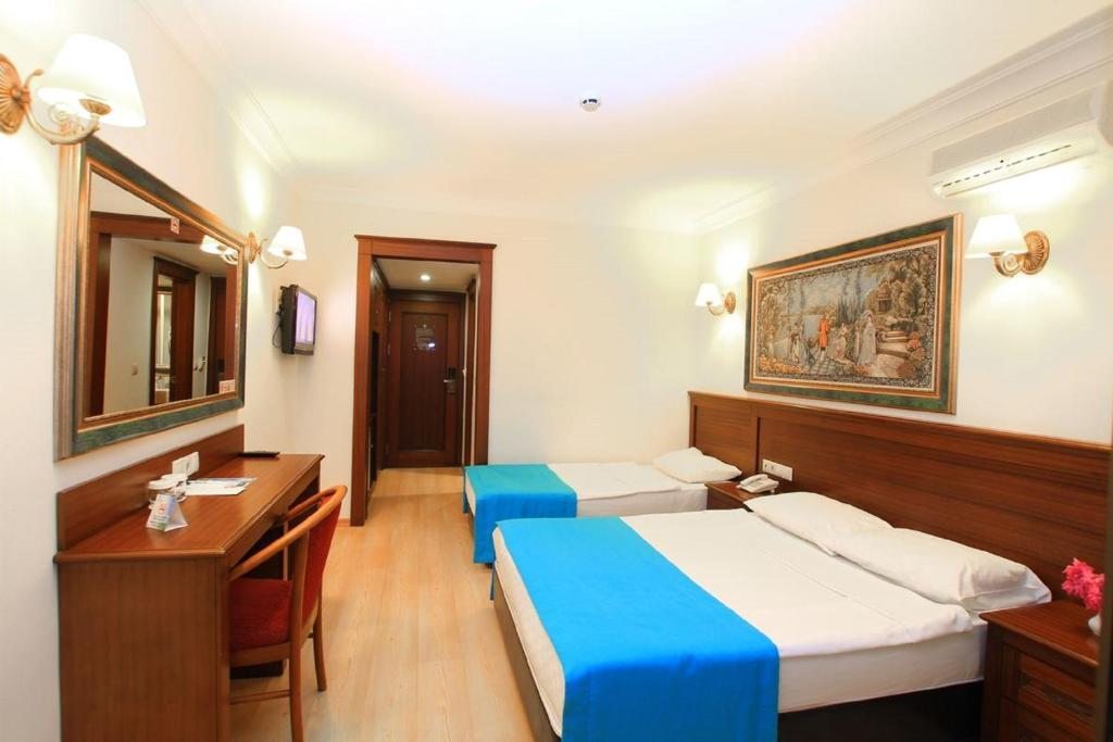 Двухместный (Двухместный номер с 1 кроватью или 2 отдельными кроватями и видом на море) отеля Kayamaris, Мармарис