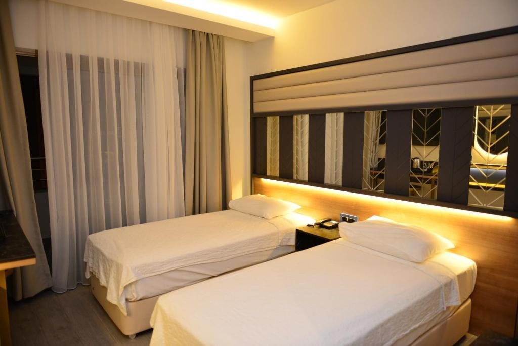 Двухместный (Стандартный двухместный номер с 1 кроватью или 2 отдельными кроватями) отеля Oasis, Мармарис