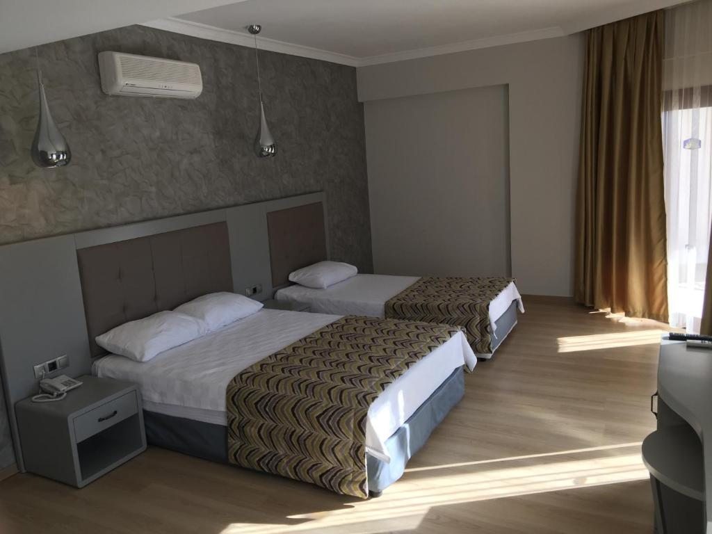 Двухместный (Двухместный номер с 1 кроватью или 2 отдельными кроватями и видом на море) отеля Pasa Garden Beach, Мармарис