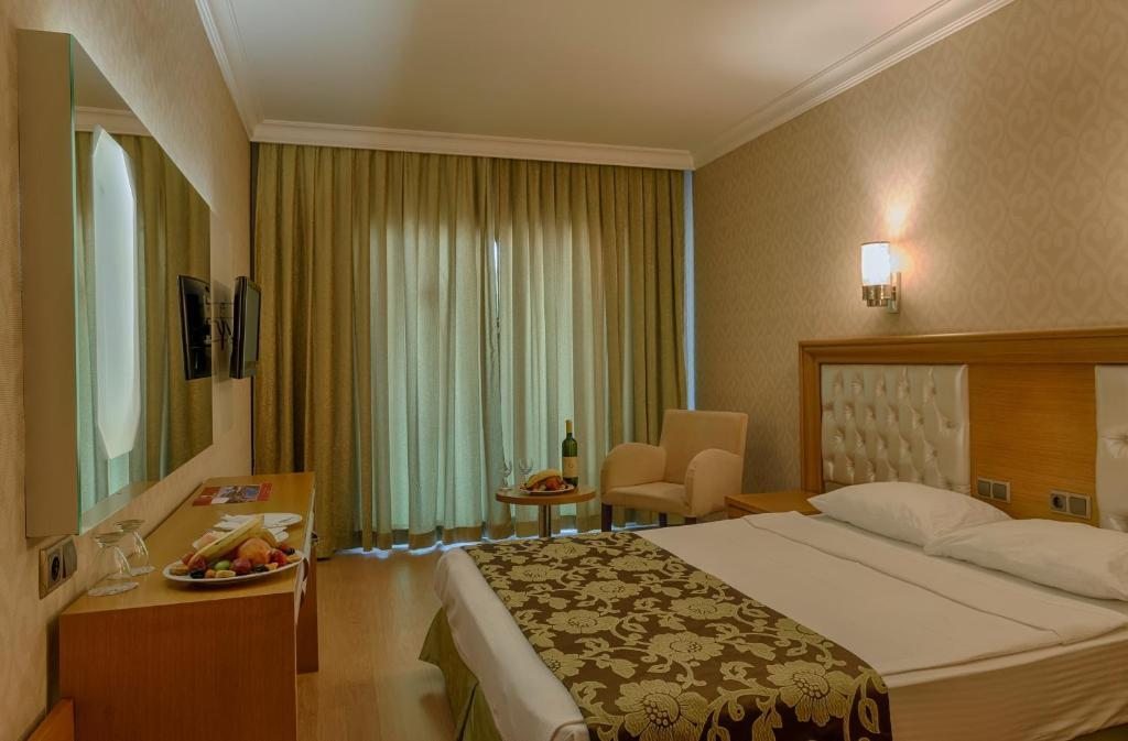 Двухместный (Стандартный двухместный номер с 1 кроватью или 2 отдельными кроватями) отеля Pasabey Hotel, Мармарис
