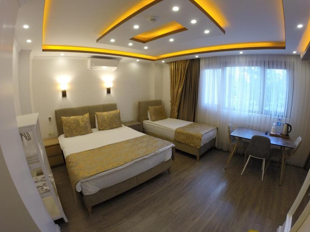 Трехместный (Трехместный номер - Подходит для гостей с ограниченными физическими возможностями) апартамента Meydan Suites, Стамбул