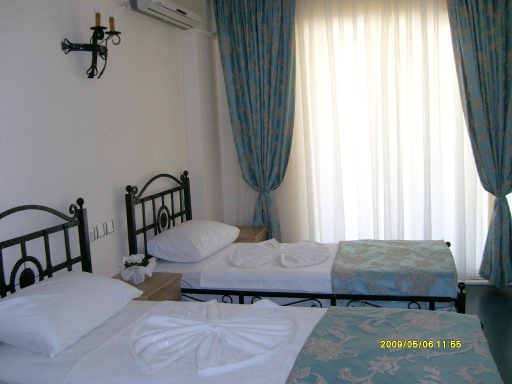 Двухместный (Стандартный двухместный номер с 1 кроватью или 2 отдельными кроватями) отеля Angels Inn Marmaris, Мармарис