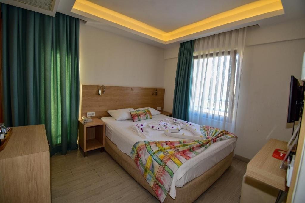 Двухместный (Стандартный двухместный номер с 1 кроватью и видом на бассейн) отеля City Hotel Marmaris, Мармарис