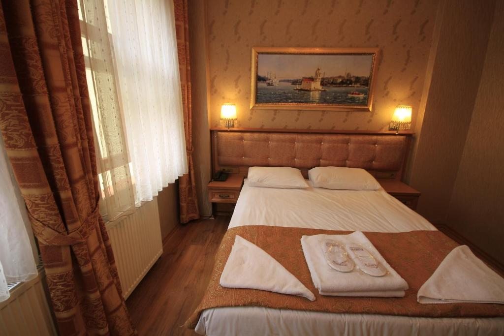 Двухместный (Двухместный номер эконом-класса с 1 двуспальной или 2 отдельными кроватями - Первый этаж), Tashkonak Studio Suites