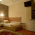 Сьюит (Семейный люкс с 2 спальнями), Tashkonak Studio Suites