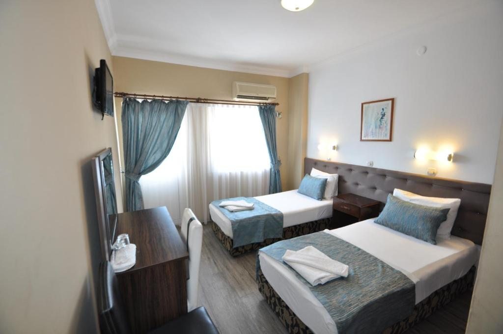 Двухместный (Двухместный номер с 1 кроватью и балконом (для 2 взрослых и 1 ребенка)) отеля Reis Maris Hotel, Мармарис