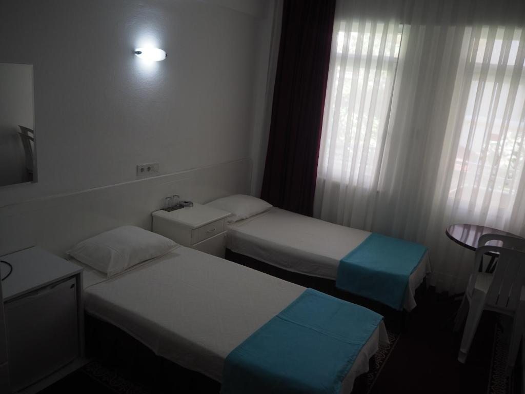 Двухместный (Стандартный двухместный номер с 1 кроватью или 2 отдельными кроватями) отеля Soykan Hotel, Мармарис