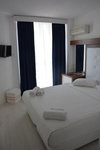 Двухместный (Двухместный номер с 1 кроватью или 2 отдельными кроватями и балконом, вид на сушу) отеля Asena, Кушадасы