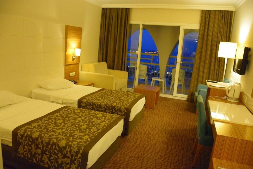 Двухместный (Стандартный двухместный номер с 1 кроватью или 2 отдельными кроватями, вид на море) отеля Goldenday Wings, Кушадасы