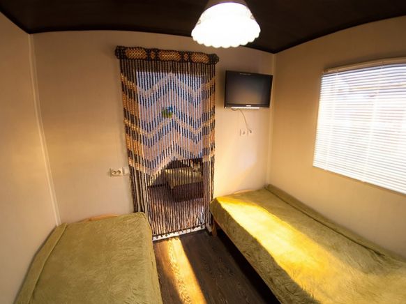 Фотография номера гостевого дома Хурмамимоза