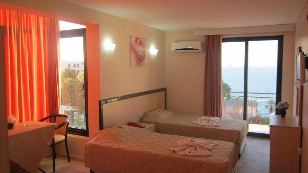 Двухместный (Двухместный номер с 1 кроватью или 2 отдельными кроватями и балконом) отеля Hotel Melike, Кушадасы