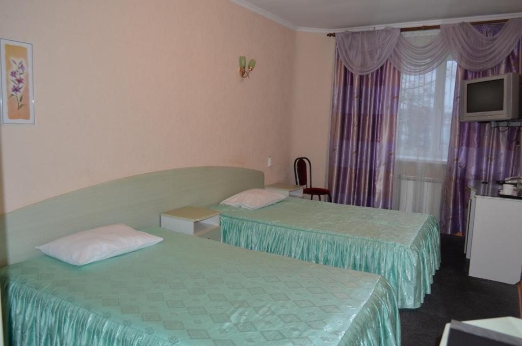 Двухместный (Стандартный двухместный номер с 2 отдельными кроватями) отеля Тернополь, Зеленодольск
