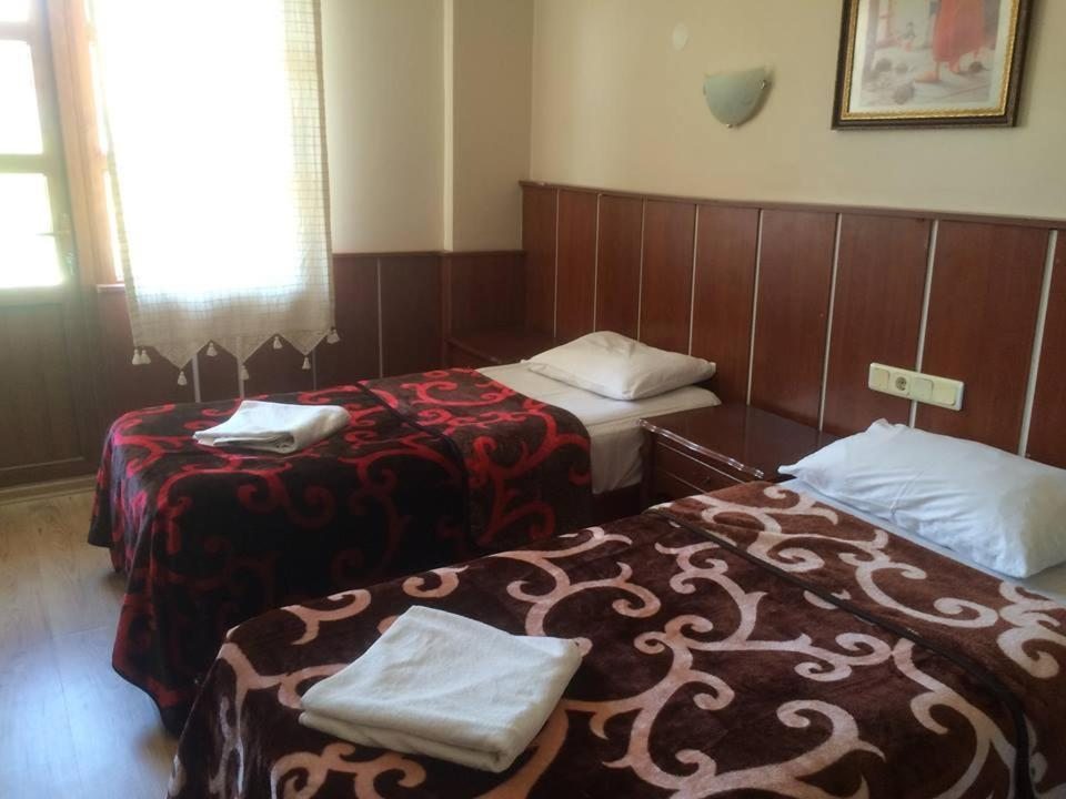 Двухместный (Двухместный номер Делюкс с 2 отдельными кроватями) отеля Sezgin, Кушадасы