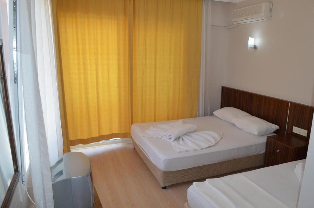 Двухместный (Двухместный номер с 2 отдельными кроватями и балконом) отеля Mulka, Айвалык