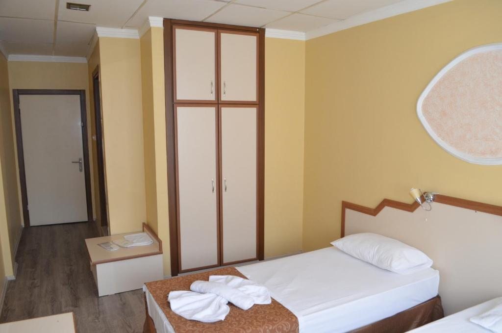 Двухместный (Двухместный номер эконом-класса с 1 кроватью) отеля Ayvalık Palas, Айвалык