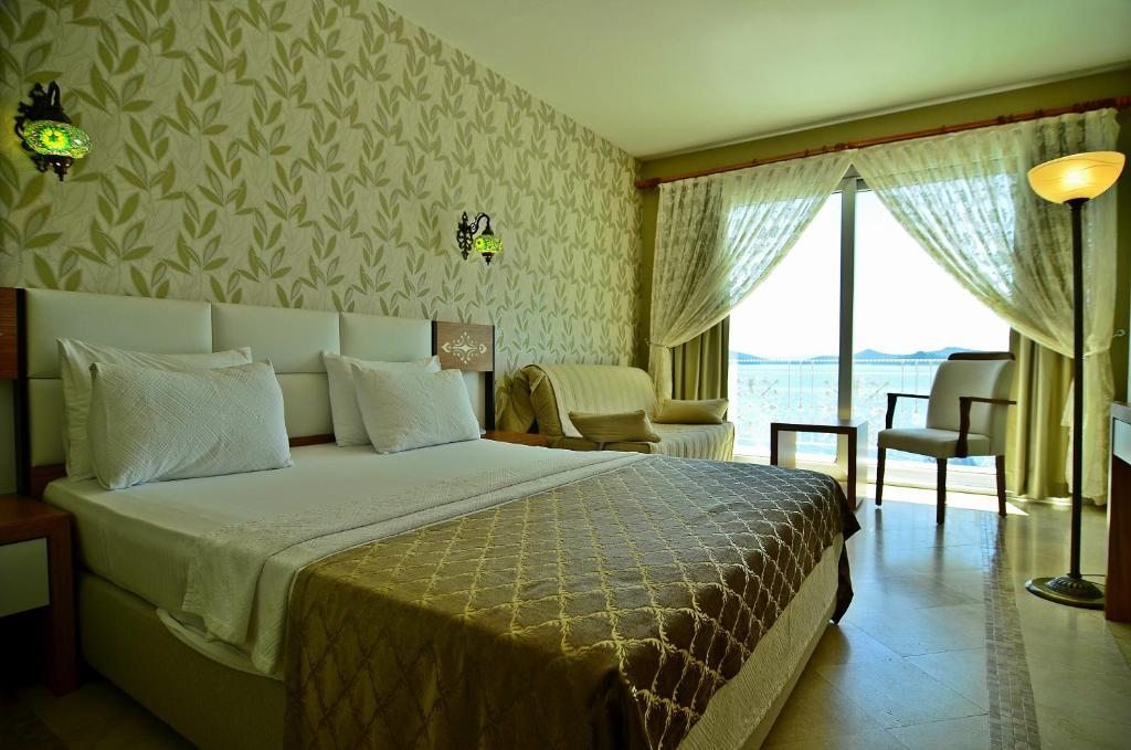 Двухместный (Стандартный двухместный номер с 1 кроватью и видом на море) отеля Cunda Kivrak, Айвалык