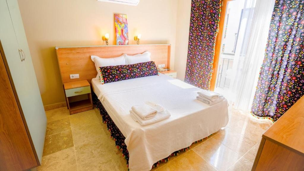Двухместный (Двухместный номер Делюкс с 1 кроватью и видом на сад) отеля Hotel Cunda Marina, Айвалык