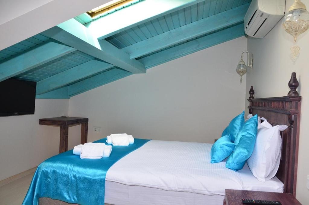 Двухместный (Бюджетный двухместный номер с 1 кроватью) отеля Orchis Buti̇k Hotel, Айвалык