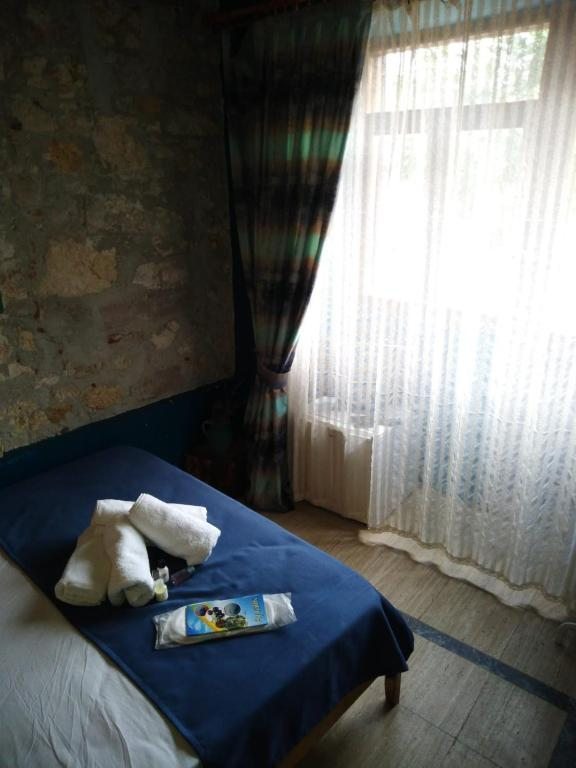Двухместный (Двухместный номер с 1 кроватью и общей ванной комнатой) отеля Konak Nazımaki, Айвалык