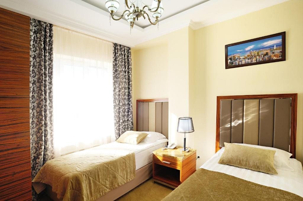 Двухместный (Двухместный номер с 2 отдельными кроватями TWIN) отеля Royal Hotel Riz, Армавир